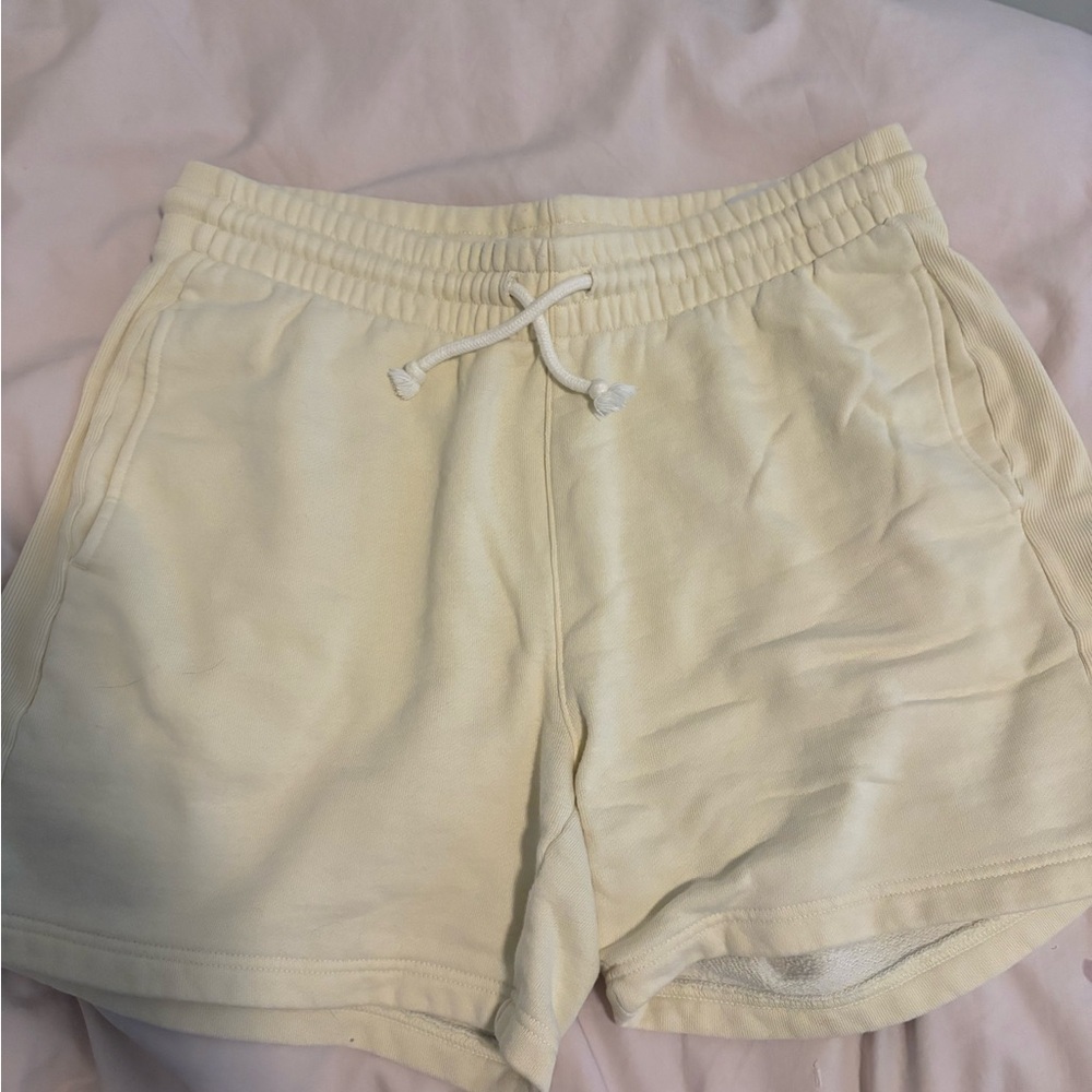 Aritzia TNA Cozy Fleece butter yellow sweat shorts size medium